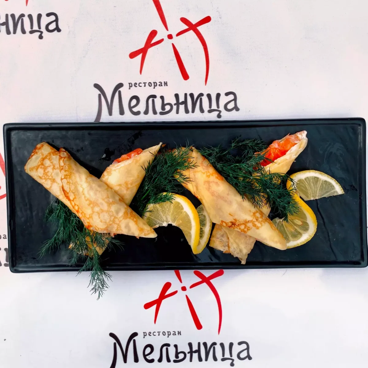 Pancakes with salmon • "Melnitsa" restaurant, Kharkiv